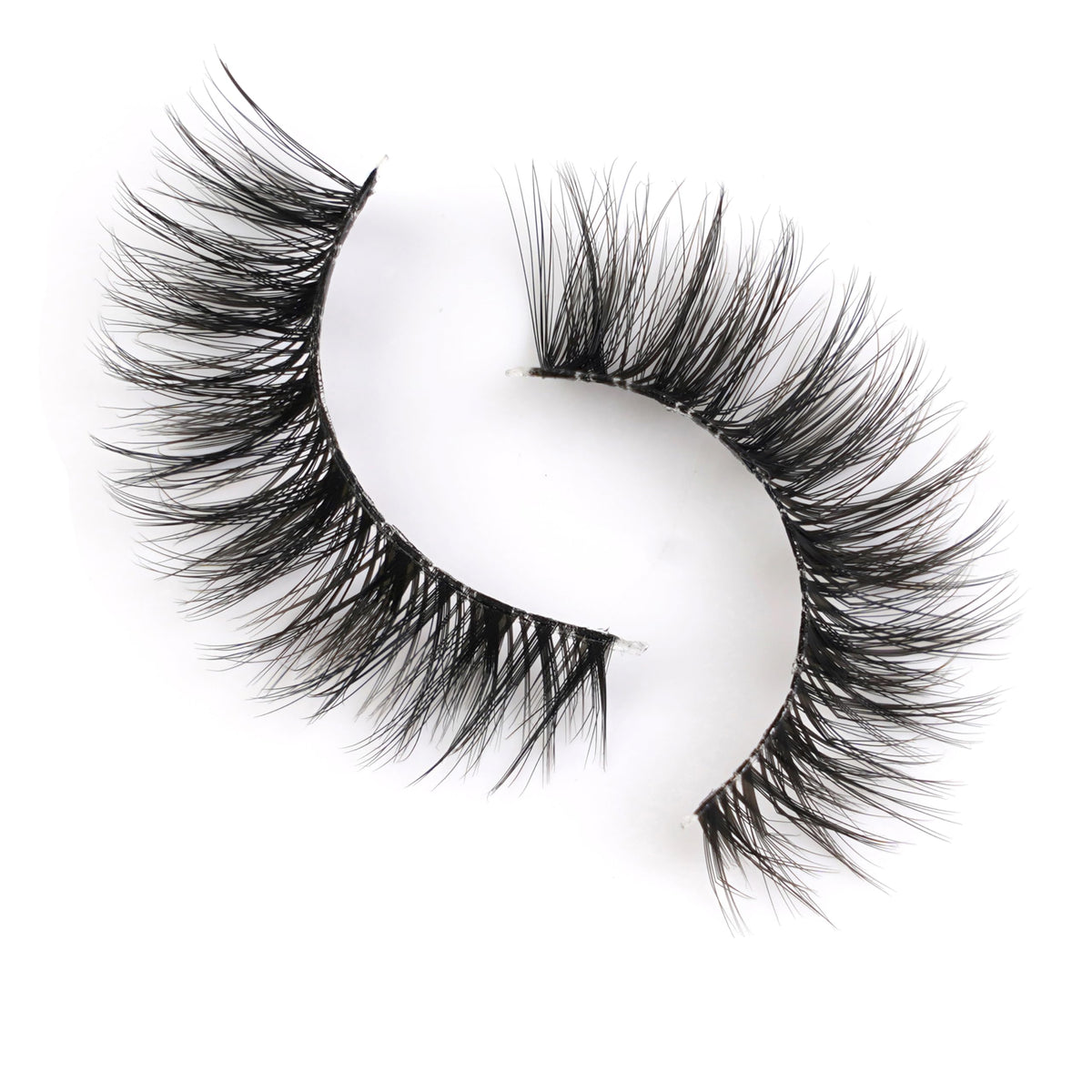 Happy Heartbeat lash in hand to show scale and lightweight, easy application