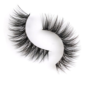 Happy Heartbeat lash in hand to show scale and lightweight, easy application