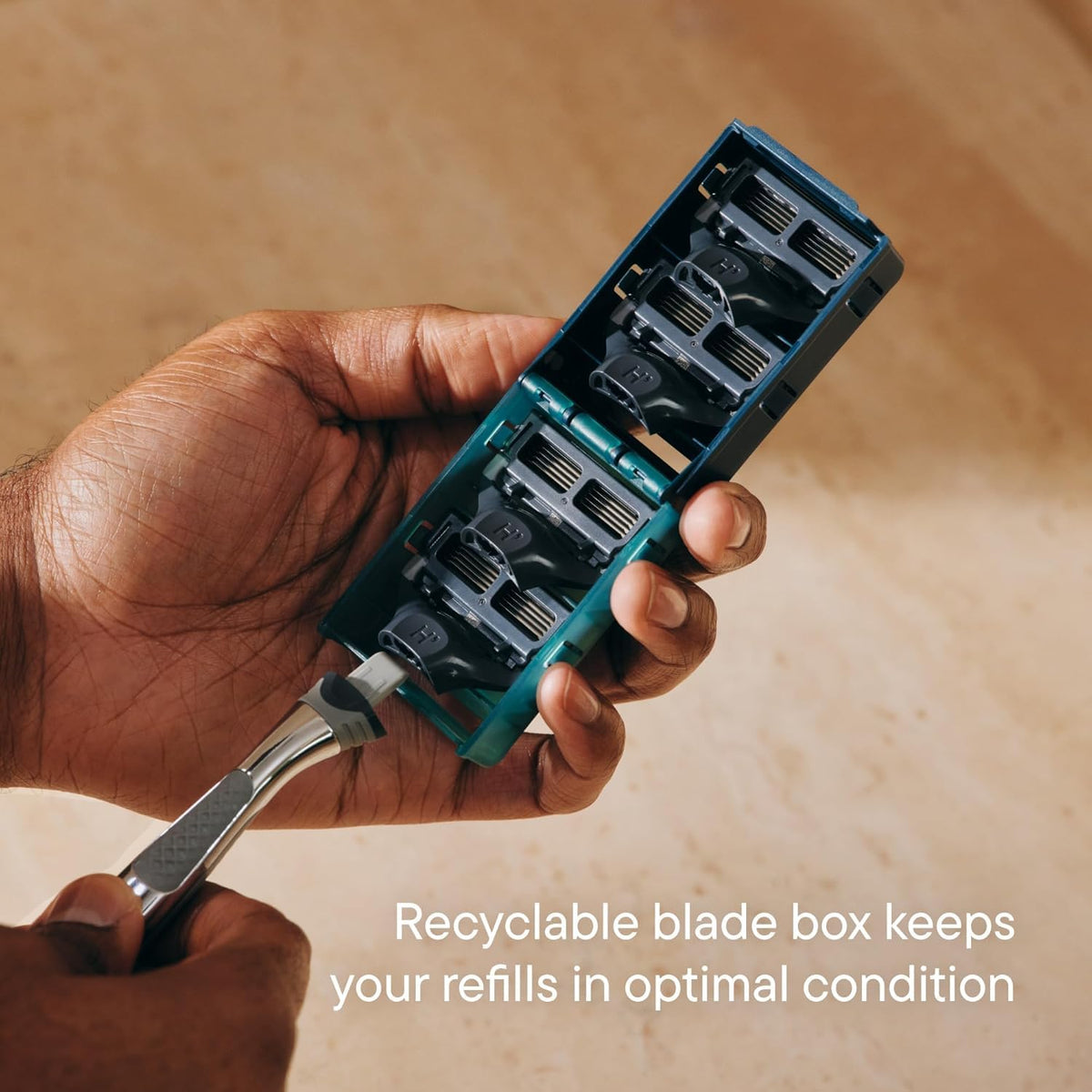 Harry's blade attached to handle in use demonstrating secure fit and control