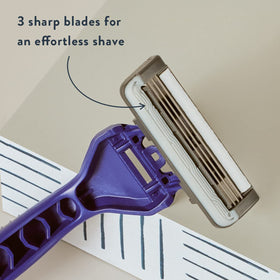 Harry's close-up of three blades delivering a smooth shave benefit