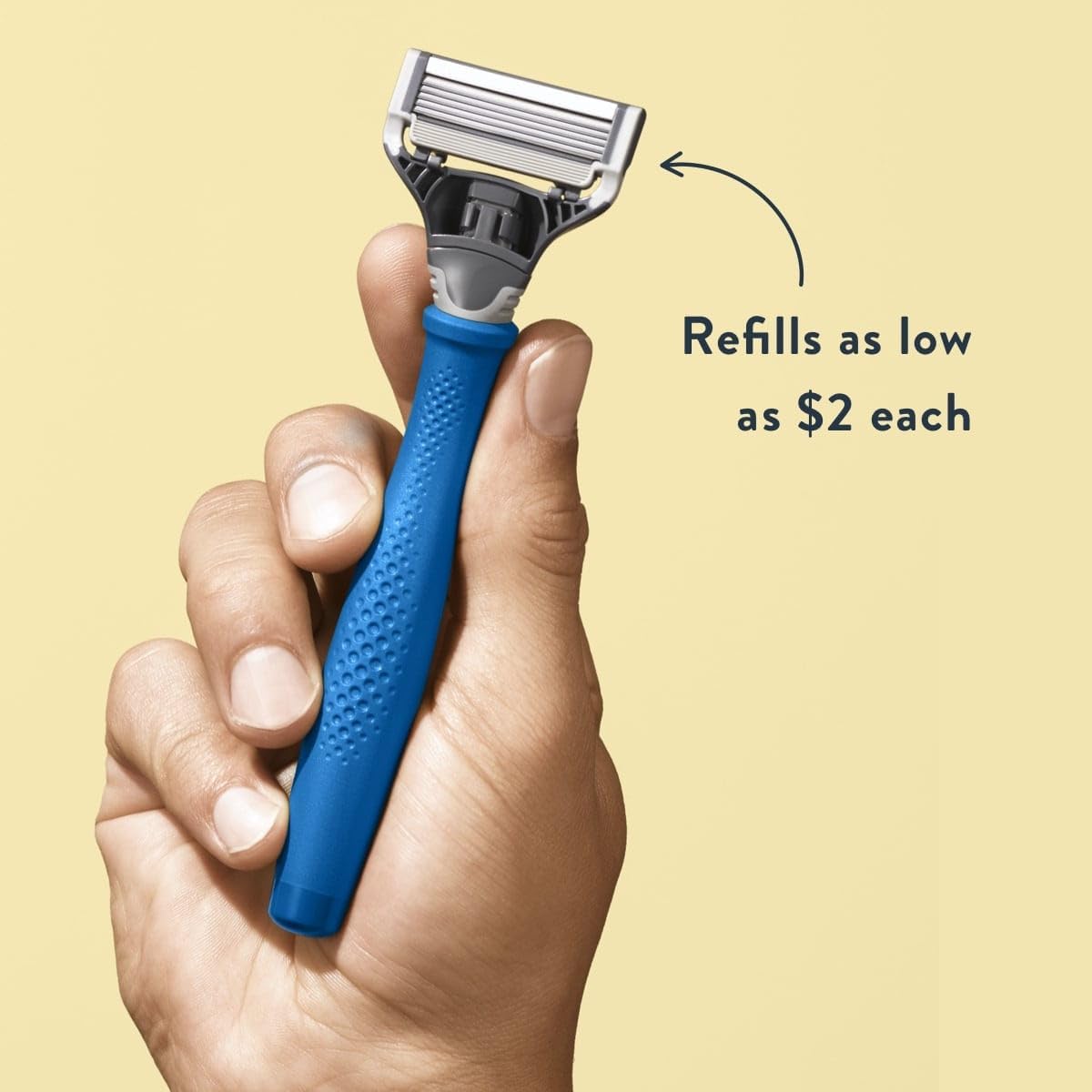 Harry's complete kit overhead with handle, five blades, shave gel, travel cover