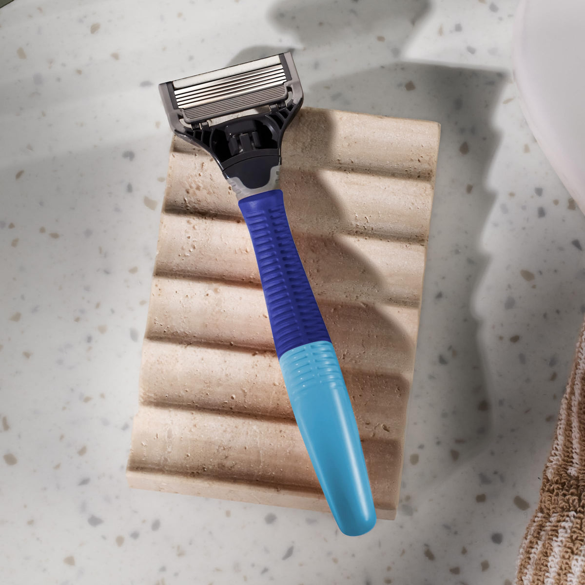Harry's Truman handle textured grip detail for secure handling when wet