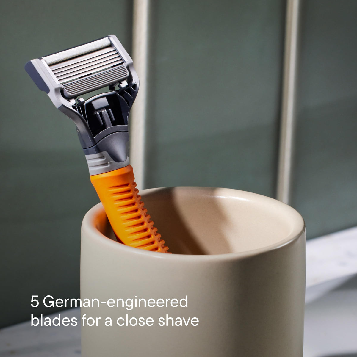 Harry's handle textured grip detail illustrating non-slip rubberized finish