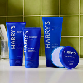 Harry's product label close-up listing castor seed oil and shea butter benefits