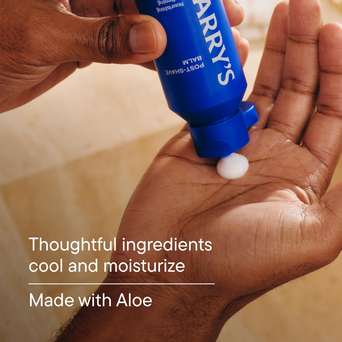 Harry's balm applied to hand illustrating fast absorption and non-greasy finish
