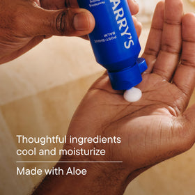 Harry's balm applied to hand illustrating fast absorption and non-greasy finish