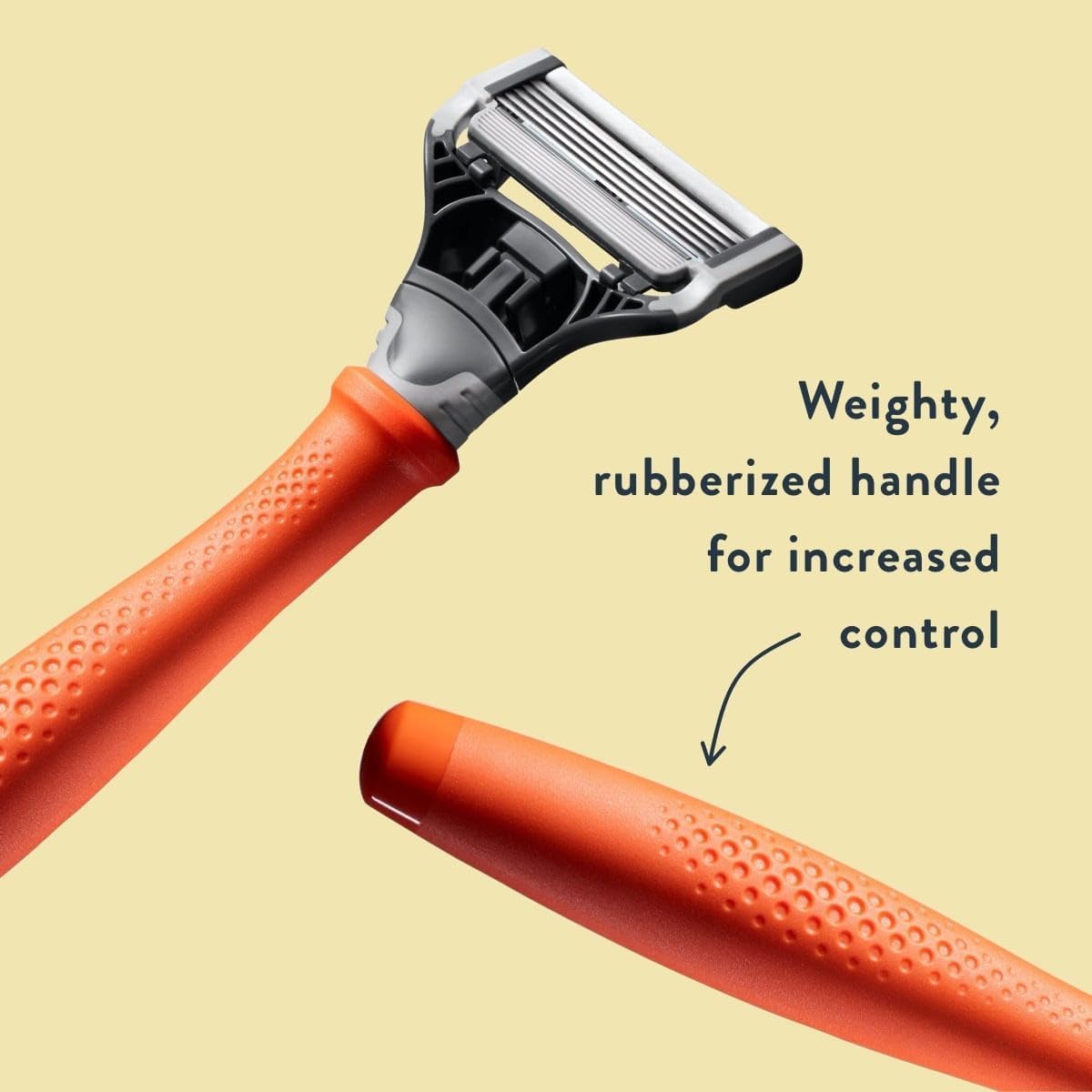 Harry's razor held in hand to show size and ergonomic balance benefit