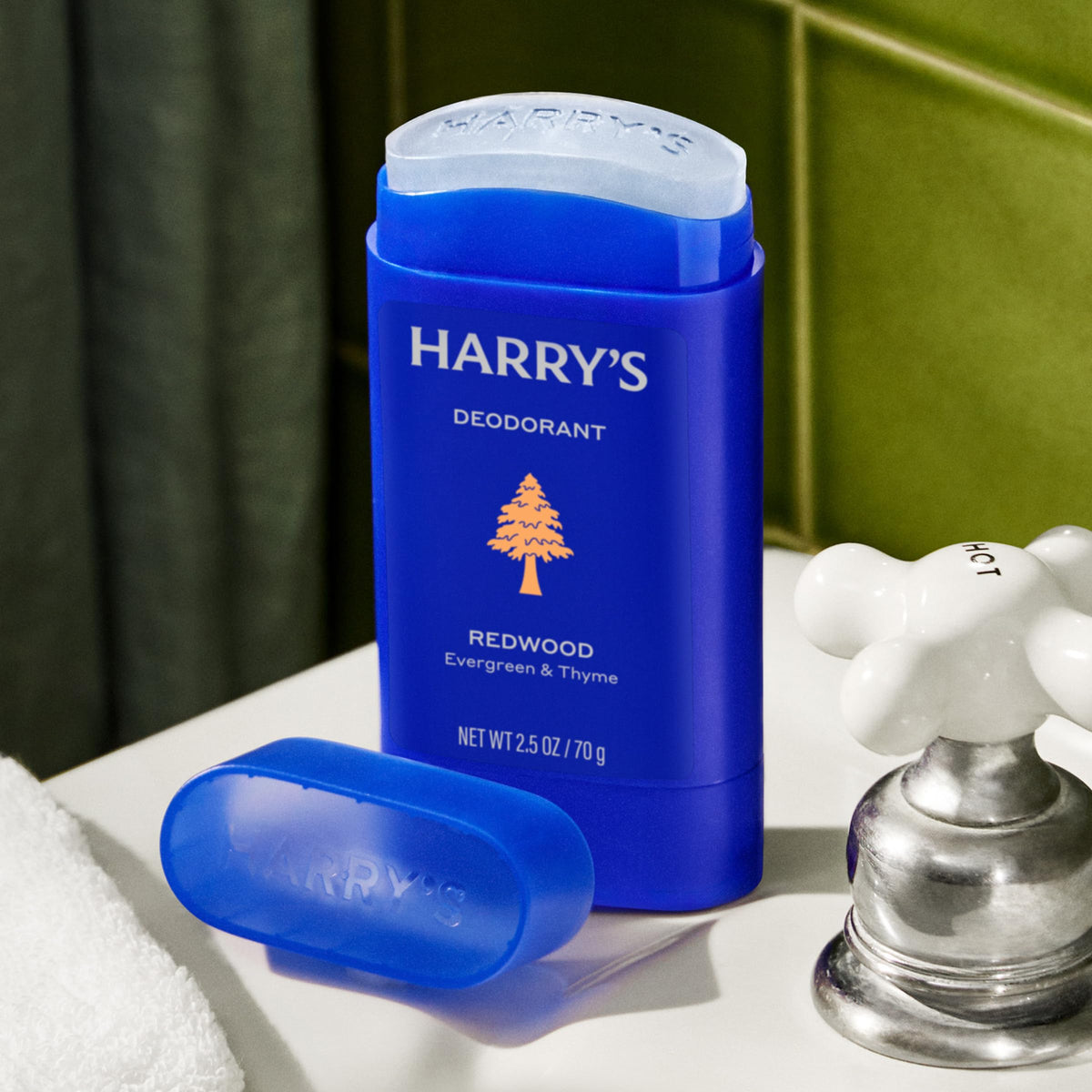 Harry's next to ruler showing 2.5 oz size and portability