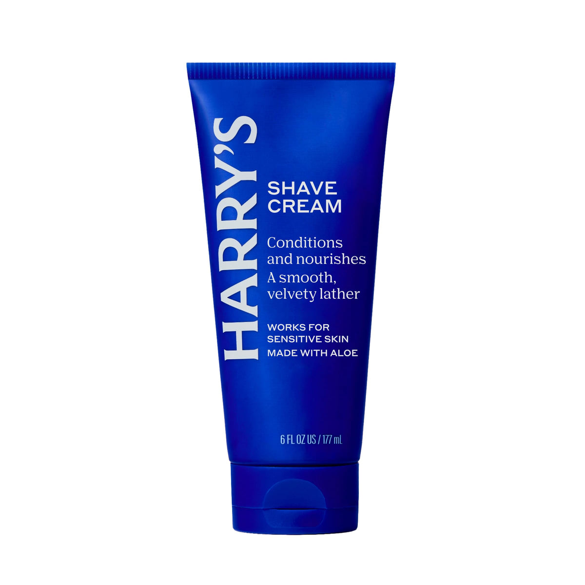 Man using Harry's shave cream in bathroom for a refreshing morning shave