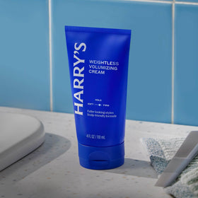 Harry's styling in use on towel-dried hair showing volume build and natural finish