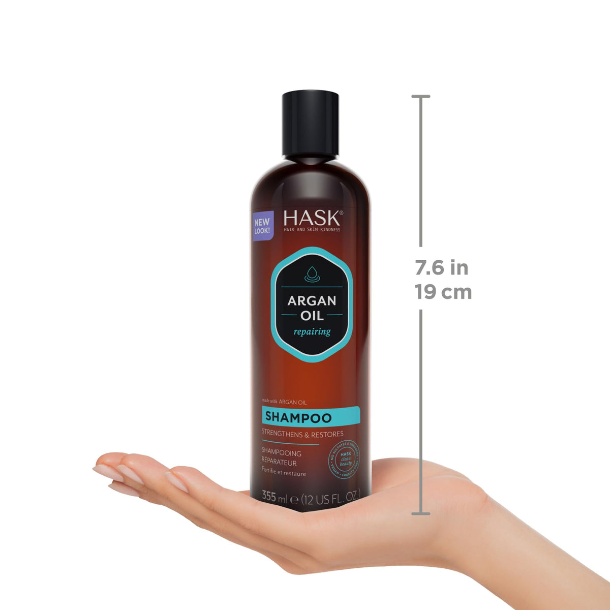 HASK shampoo bottle beside argan nuts highlighting natural oil
