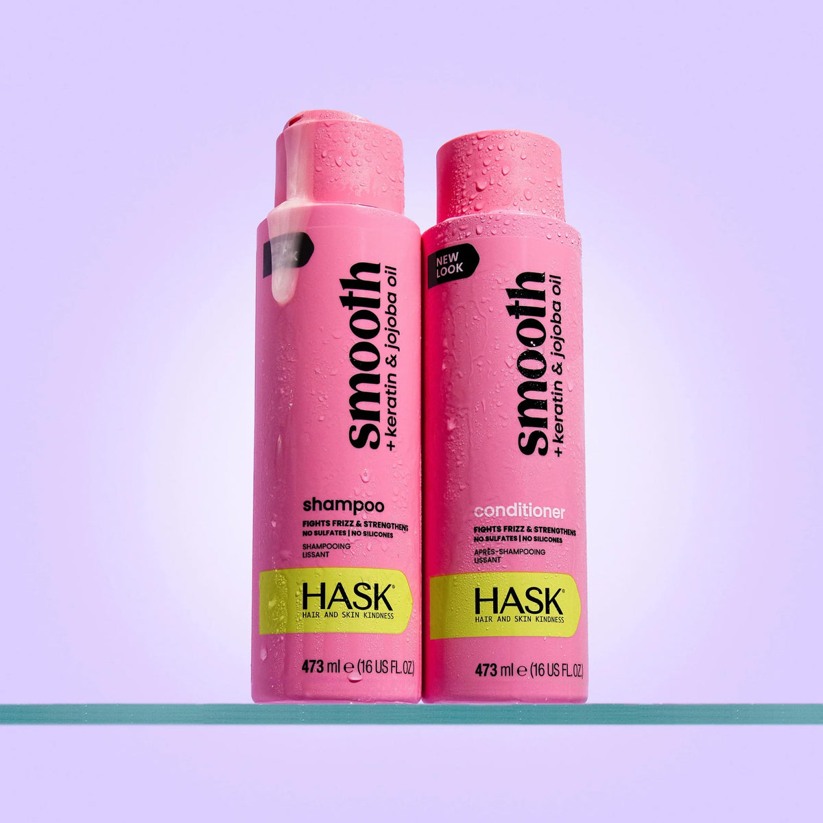 HASK lifestyle shot at beach with smooth hair showcasing frizz-free finish