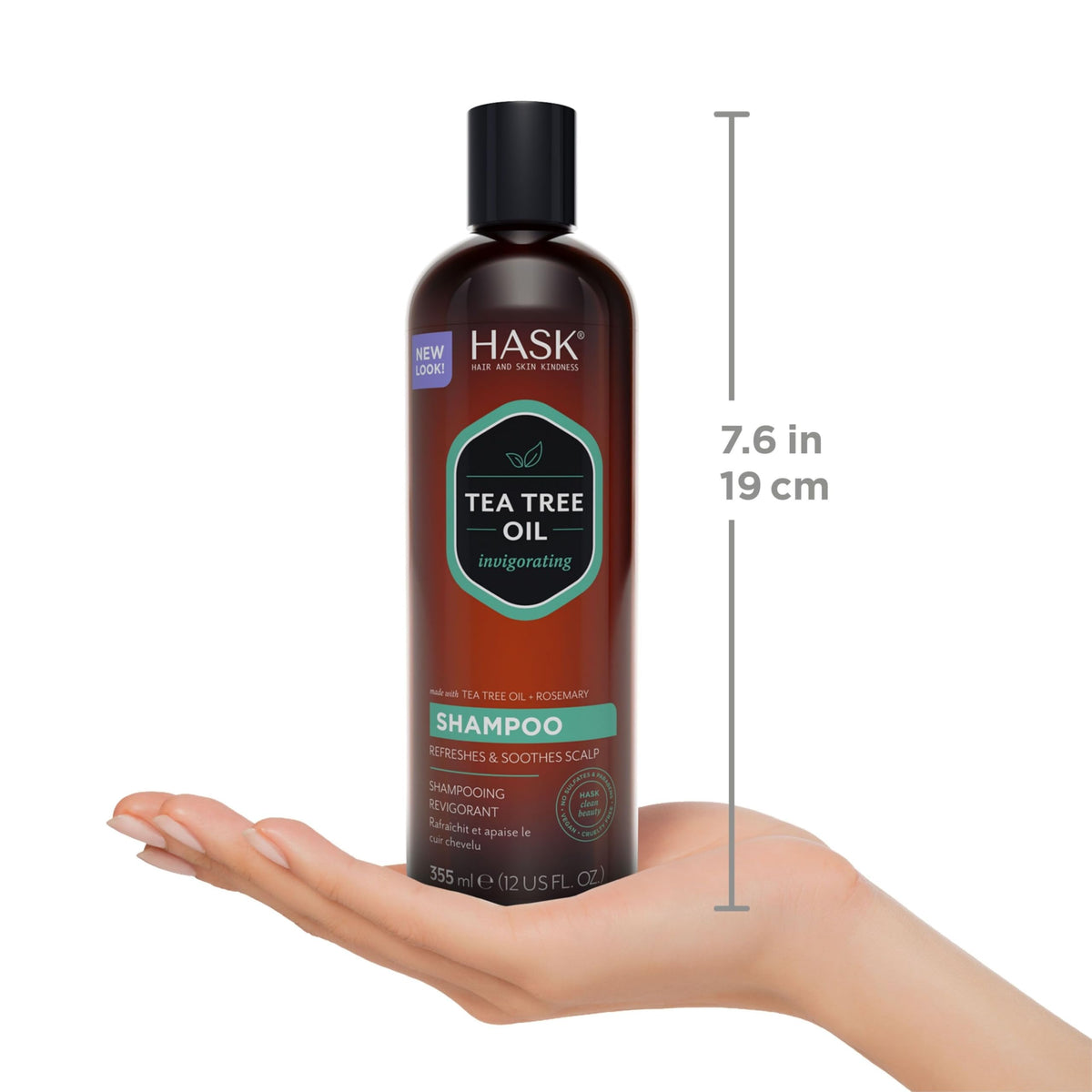 Applying HASK shampoo to wet hair to demonstrate scalp massage benefit