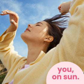 Hawaiian Tropic worn by person at beach illustrating everyday sun protection use