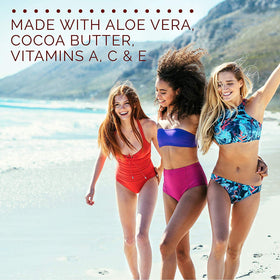 Hawaiian Tropic tube held in hand to show 4 g size for easy portability