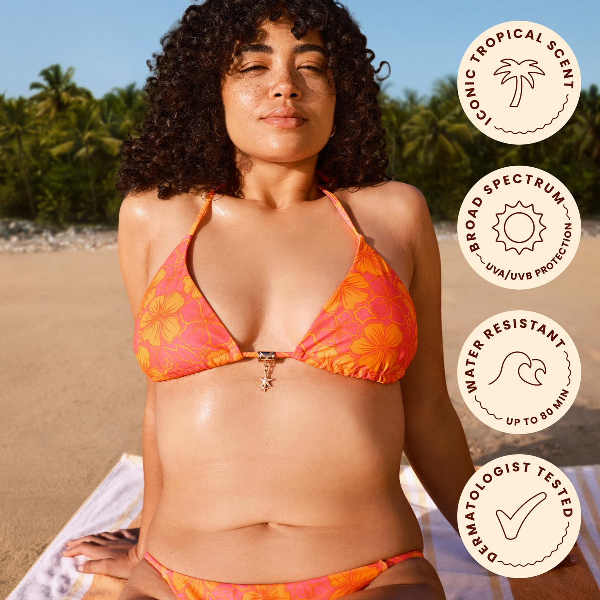 Hawaiian Tropic lotion droplet on skin showing silky hydration and non-greasy finish