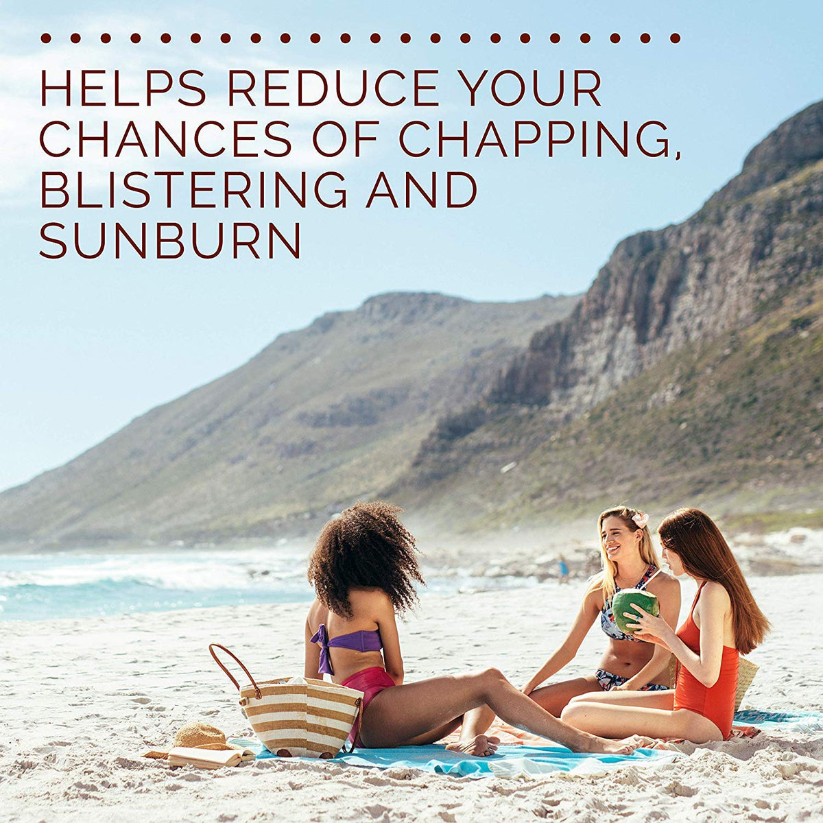 Hawaiian Tropic lip balm pictured on sand with sunglasses emphasizing outdoor use