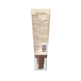 hawaiian tropic tube next to credit card showing compact travel-friendly size