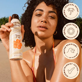 Hawaiian Tropic spray texture close-up with fast-dry, non-greasy finish