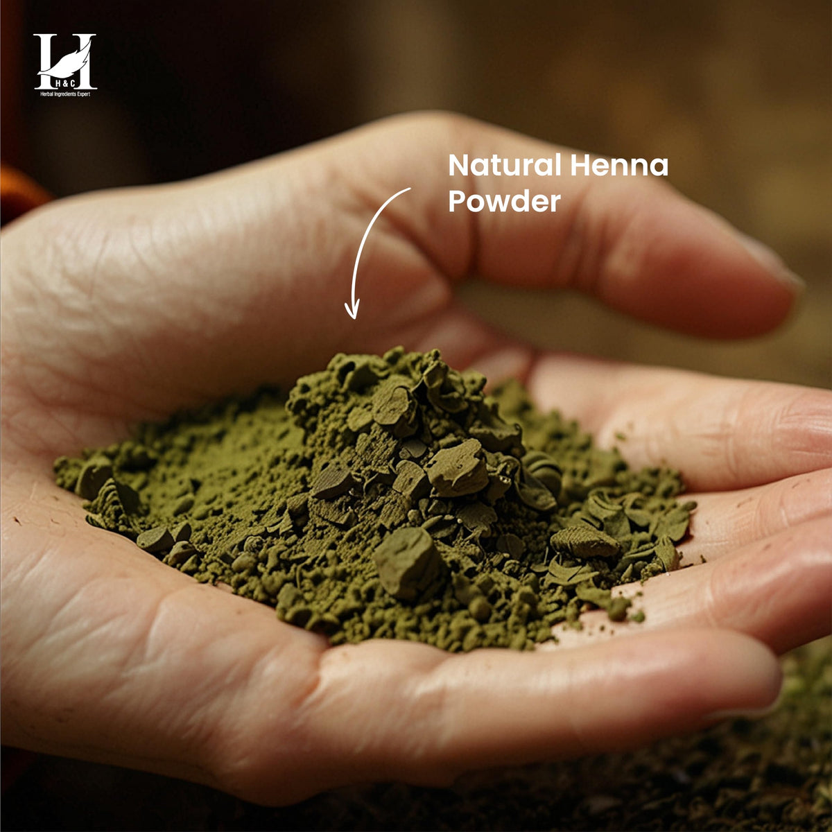 Hand holding 227g H&C henna bag for scale to plan needed portion