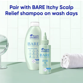 Head & Shoulders bottle on bathroom counter showing daily use convenience