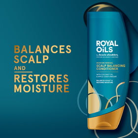 Applying Head & Shoulders conditioner in shower for detangling benefit