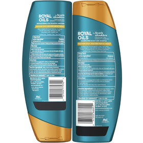 Head & Shoulders bottles held in hand showing size and travel convenience