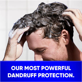 Head & Shoulders bottle in shower showing practical in-shower use benefit