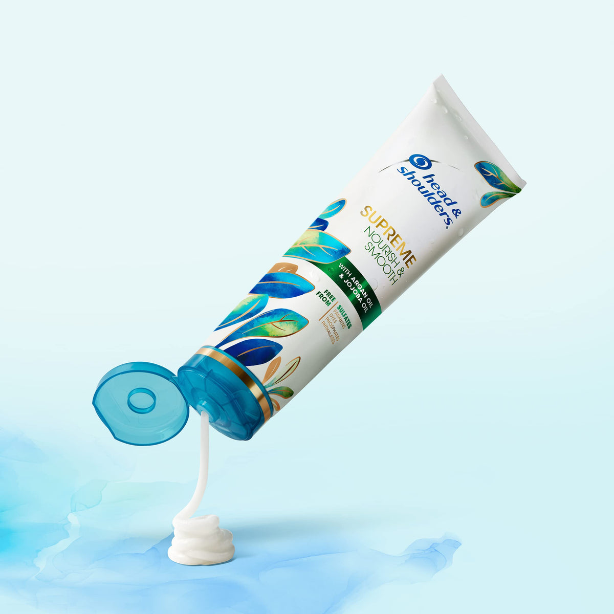 Argan and jojoba oil display with Head & Shoulders highlighting natural oil benefits