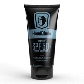 HeadBlade HeadLube in beach setting demonstrating water resistance during outdoor activity