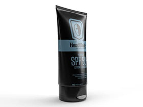 HeadBlade HeadLube tube open with lotion dispensed for quick application benefit