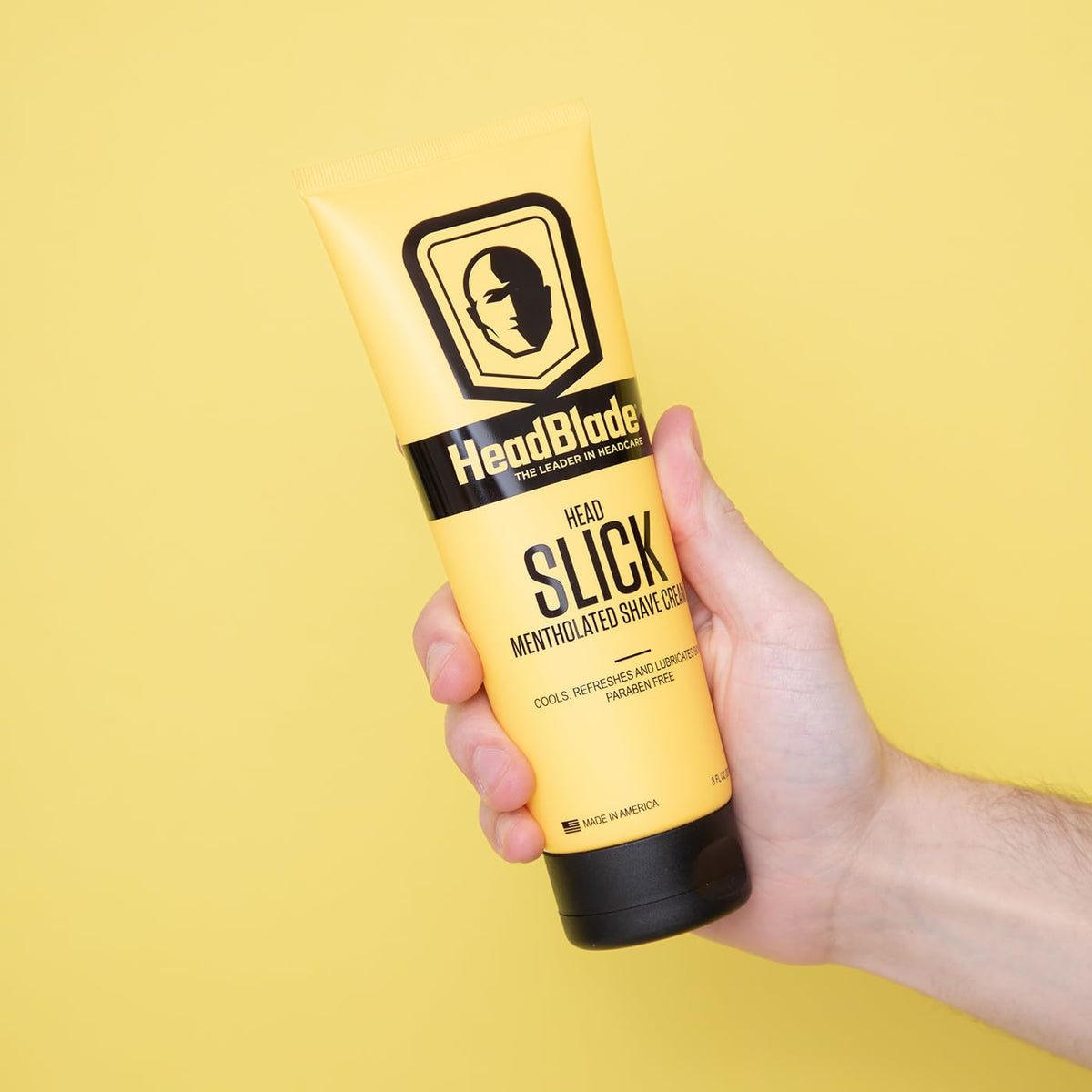 HeadBlade HeadSlick cream applied to scalp demonstrating easy spread