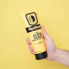 HeadBlade HeadSlick cream applied to scalp demonstrating easy spread