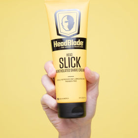 HeadBlade HeadSlick 8 oz next to common items showing true size advantage