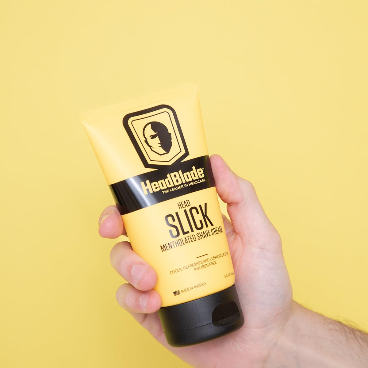 Cream texture on hand from HeadBlade HeadSlick, demonstrates slick glide benefit