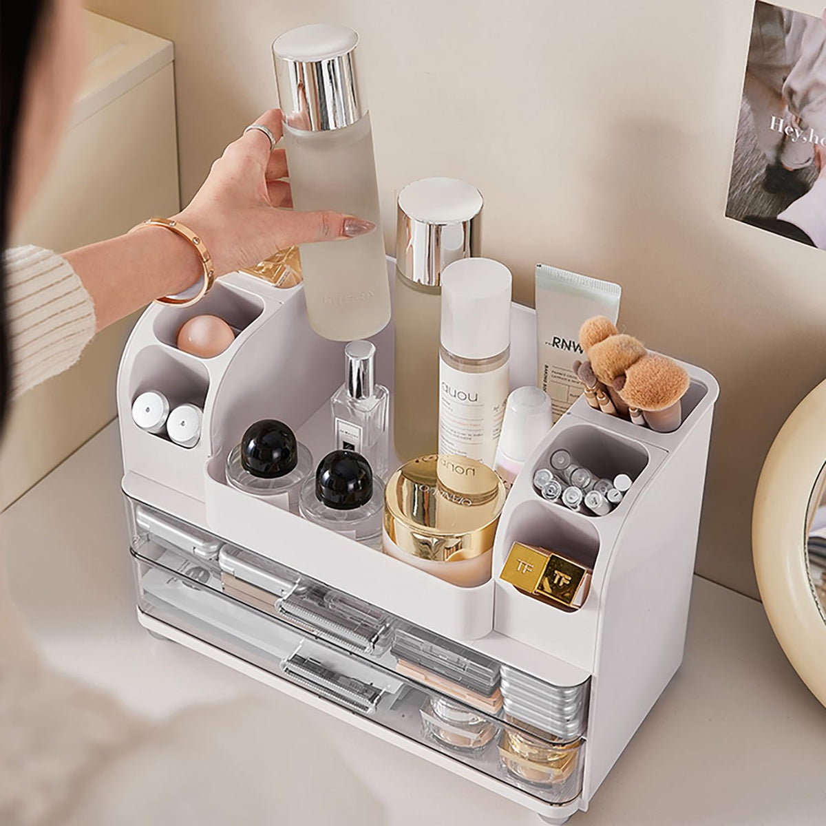 Heaime close-up of compartments with brushes and lipsticks for visibility