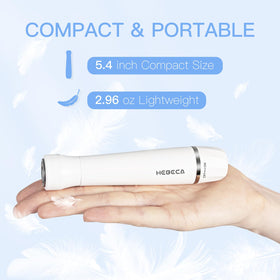 HEBECA trimmer held in hand demonstrating compact scale for travel convenience