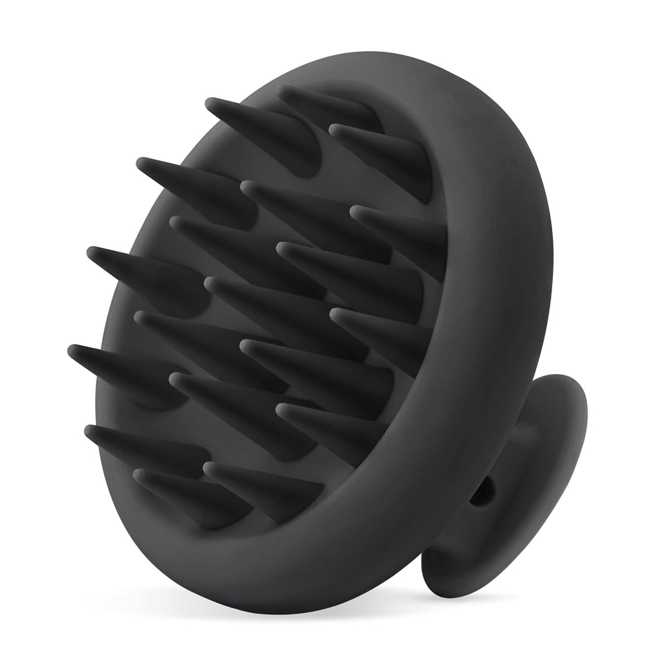 HEETA front view showing compact scalp massager and sleek black finish for easy storage