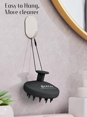 HEETA hanging on a shower hook to show tidy storage and mildew prevention
