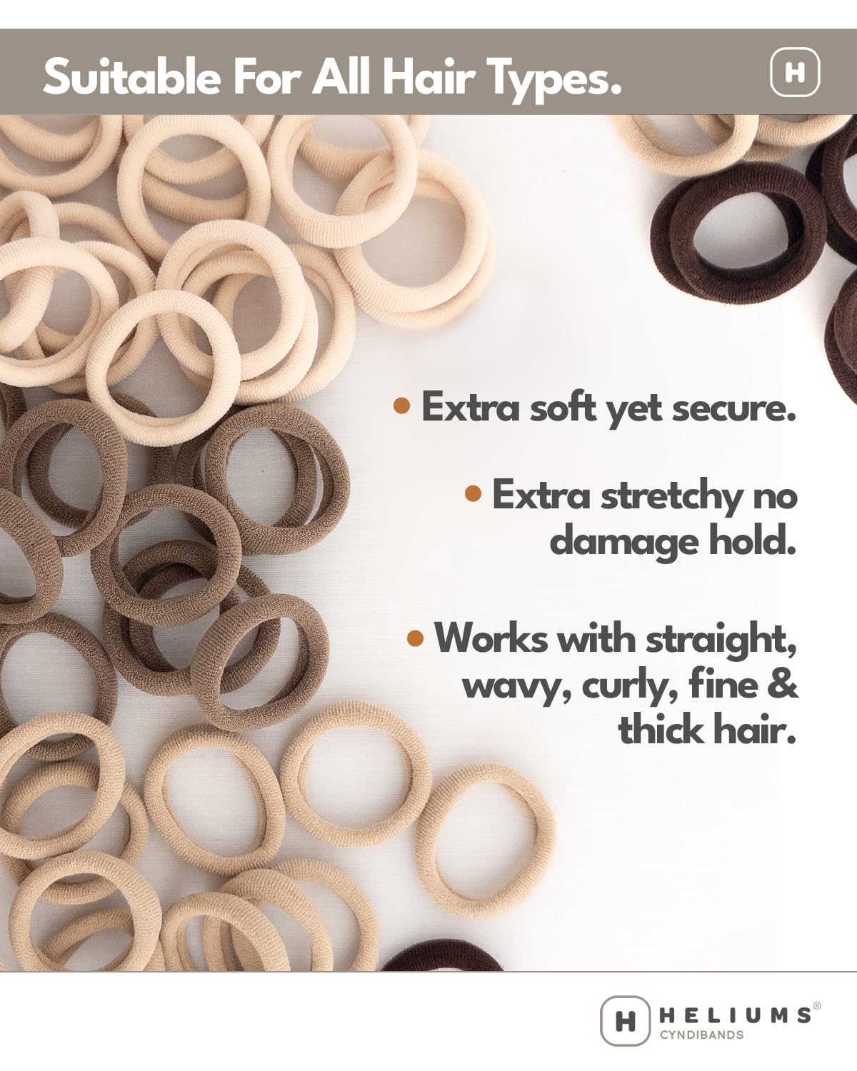 Heliums band stretched by hand showing elasticity and secure hold benefit for all hair types