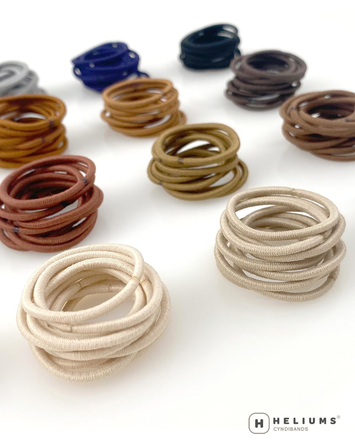 Heliums child wearing mini ponytail holders, gentle and safe for kids