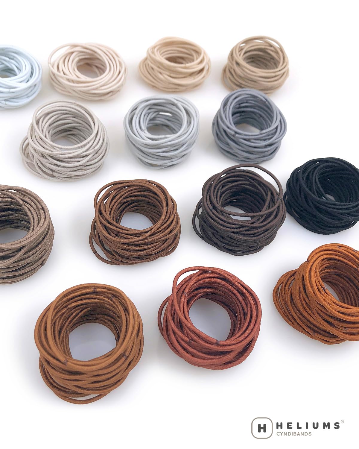 Heliums open pack displaying forty elastics for long-lasting supply