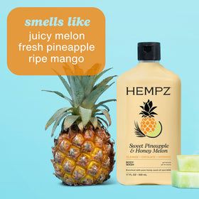 Hempz bottle next to shower loofah in bathroom scene, suggests refreshing daily use