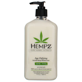 Hempz applying lotion to arm demonstrating quick hydration benefit