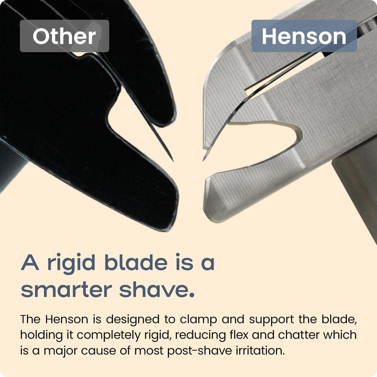 Henson AL13 held in hand for scale showing compact ergonomic benefit