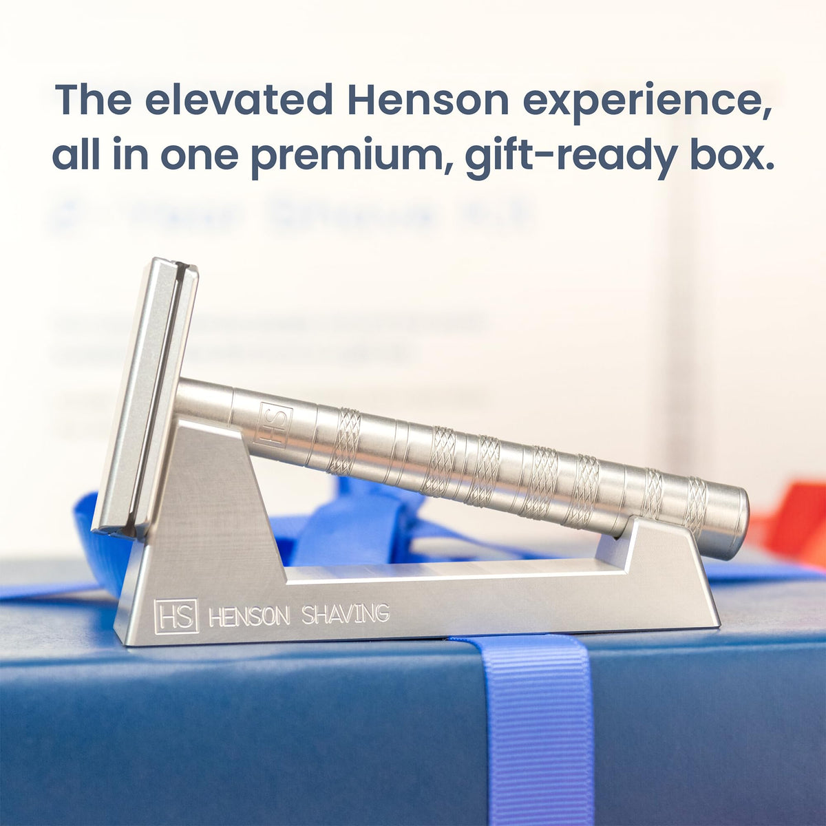 Henson AL13 razor head closeup highlighting precise blade alignment benefit