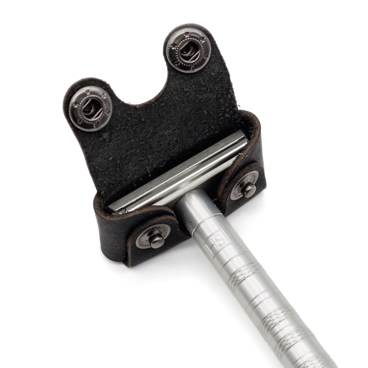 Henson Shaving cover on razor head inside travel kit for secure transportation