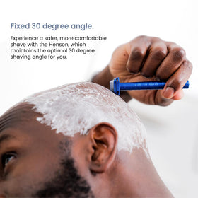 Henson Shaving head close-up highlighting blade support and cleaner cuts benefit