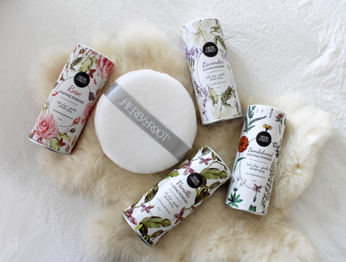 Herb & Root full-size powder beside common cosmetics to show compact size
