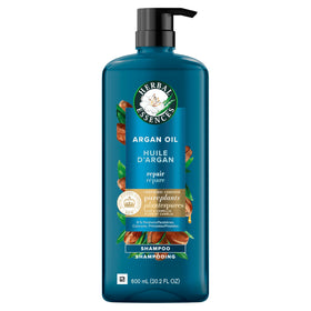 Herbal Essences shampoo on shower ledge in use scene suggesting daily routine